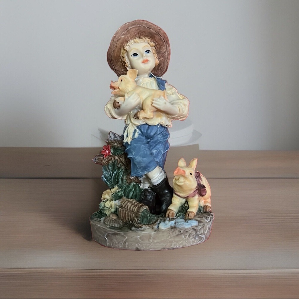 MVP DESIGNS COMMERCE POLY CHILD - RESIN FIGURINE BOY WITH PIGS